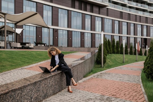 What specific steps are needed for a UK-based outdoor adventure company to comply with safety regulations?